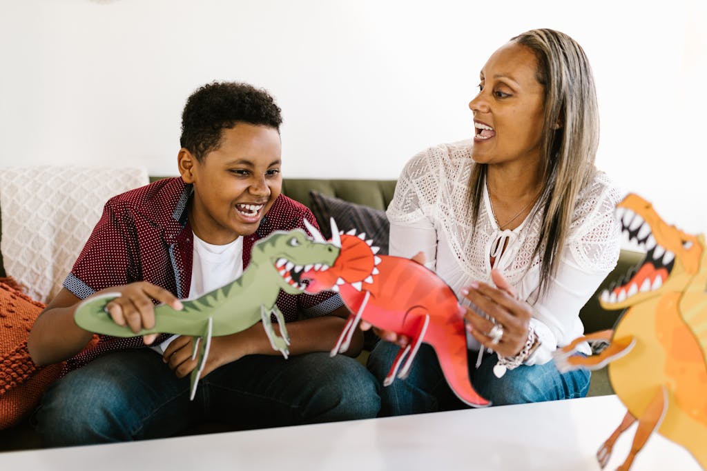 A joyful moment as a mother and son bond over crafts and homeschool